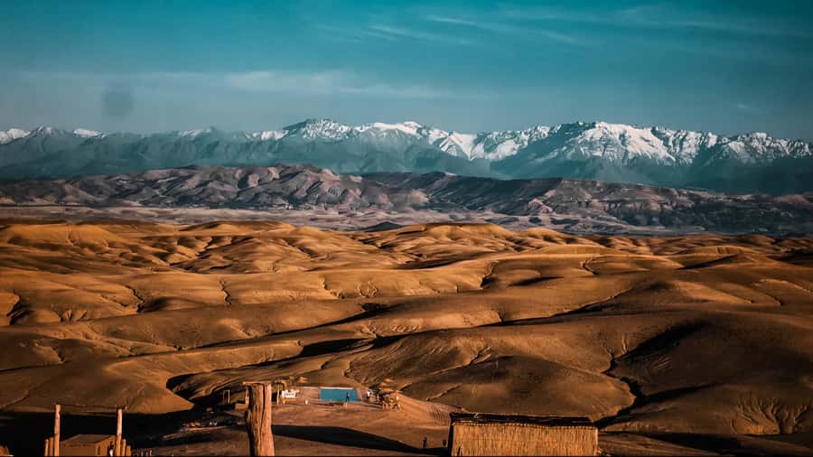 Marrakech: Agafay Desert Dinner, Camel Ride, and Music Show - Hotel pickup and the ride out of Marrakech (timing tips)