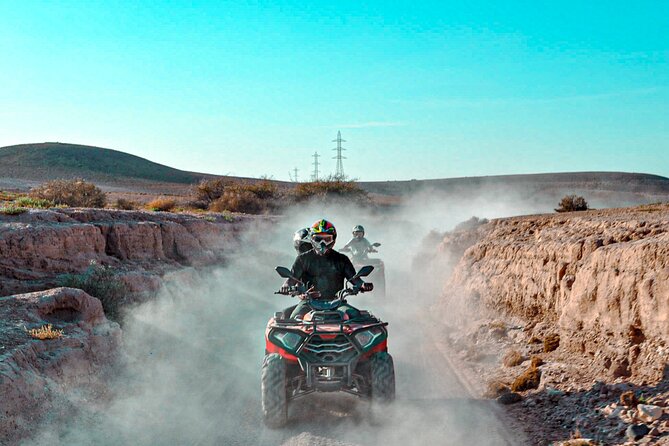 Marrakech Agafay Desert Package Quad Bike&Camel POOL Dinner Show. - Quad biking in Agafay: adrenaline with a guided route