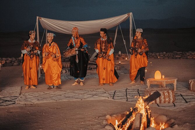 Marrakech: Agafay Desert Quad Biking Tour with Dinner-Show - Berber Tent Dinner: Tea, Tajine, and the Dust-Off Detail