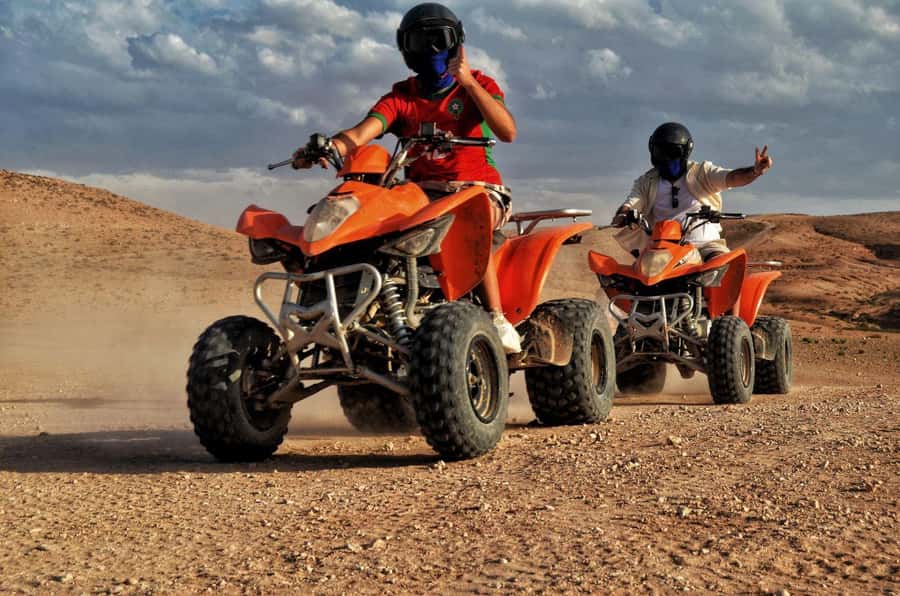 Marrakech: Agafay Desert Quad & Camel Rides with Dinner Show - The ride in: pickup, minibus timing, and what to wear