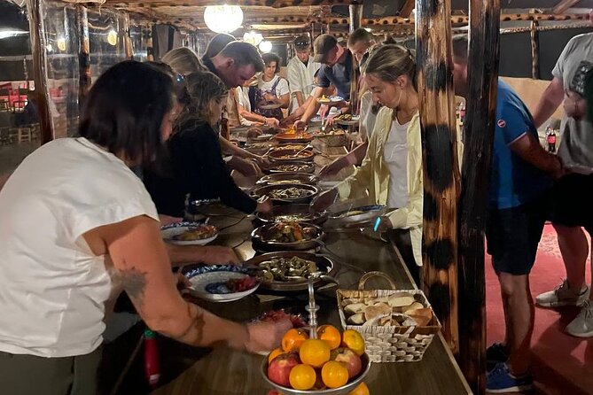 Marrakech Amazing Dinner Show in Agafay Desert, Sunset Camel Ride - Dinner under the stars: Moroccan food, bonfire energy, live music