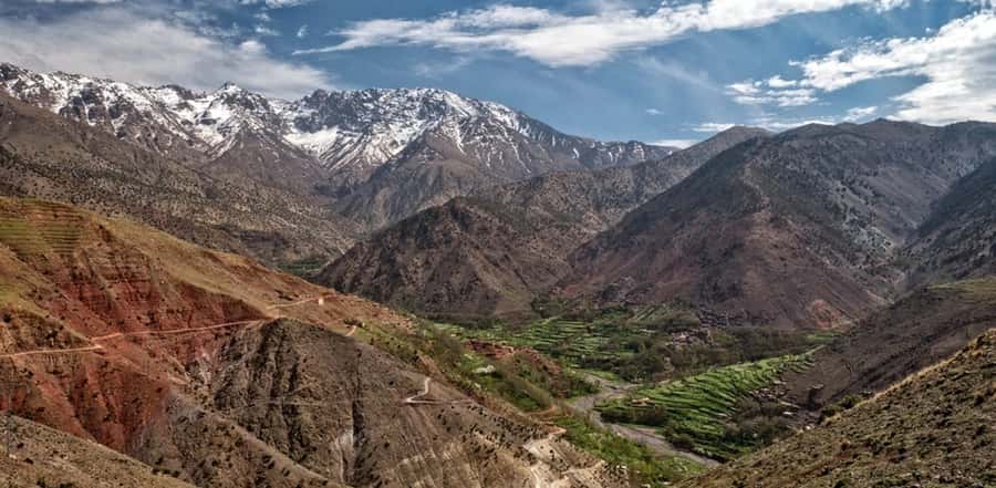 Marrakech: Atlas Mountain, Berber Villages, & Valleys Tour - Aroumd Village: terraces, irrigated fields, and Berber family hospitality