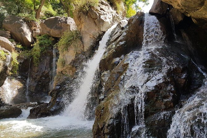 Marrakech: Atlas Mountains & Berber Villages Tour & Camel Ride - Mint Tea, Orchards, Waterfalls, and Village Views