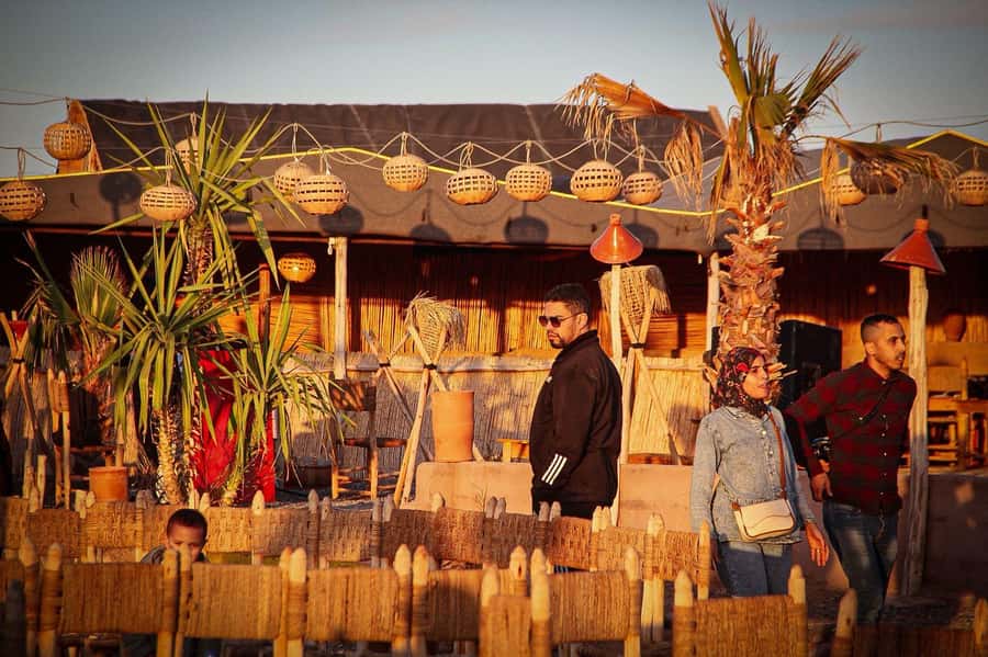 Marrakech: Camel Ride, Dinner, Pool, and Fire Show in Agafay - Welcome Tea, Lantern Light, and That First Camp Calm