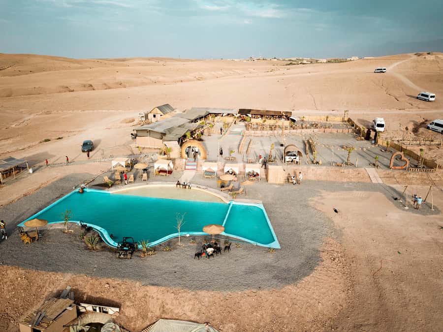 Marrakech: Camel Ride, Dinner, Pool, and Fire Show in Agafay - Dinner Under the Stars: Tagine, Couscous, and the Night’s Main Meal