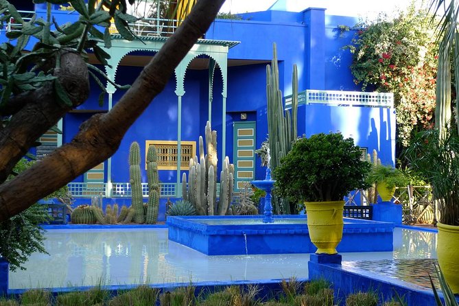 Marrakech City Highlights Half-Day Tour - The walled-medina walk: souks, bakeries, and daily life