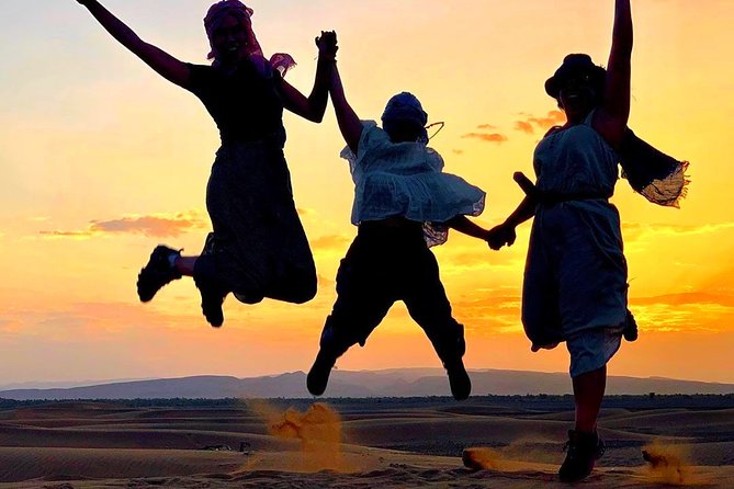 Marrakech Desert: Dinner Show with Quad Bike and Camel Ride - Quad biking in the rocky dunes: fun, but read the fine print