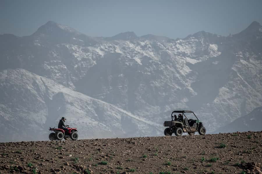Marrakech: Half-Day Agafay Rock Desert Buggy Tour - The buggy setup: helmets, goggles, and 2-person rides
