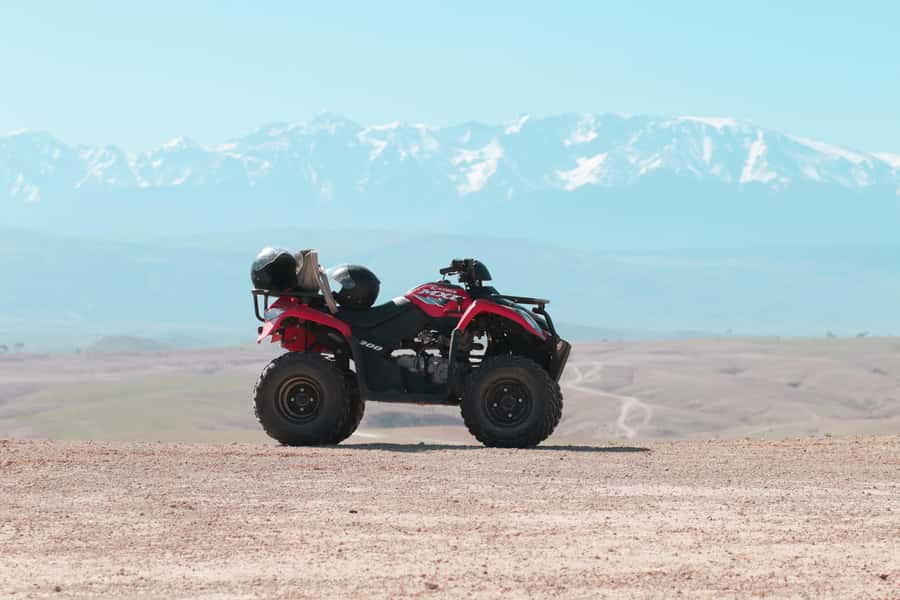 Marrakech: Half-Day Desert Quad Tour with Camel Ride - Safety, speed limits, and the concrete-block warning