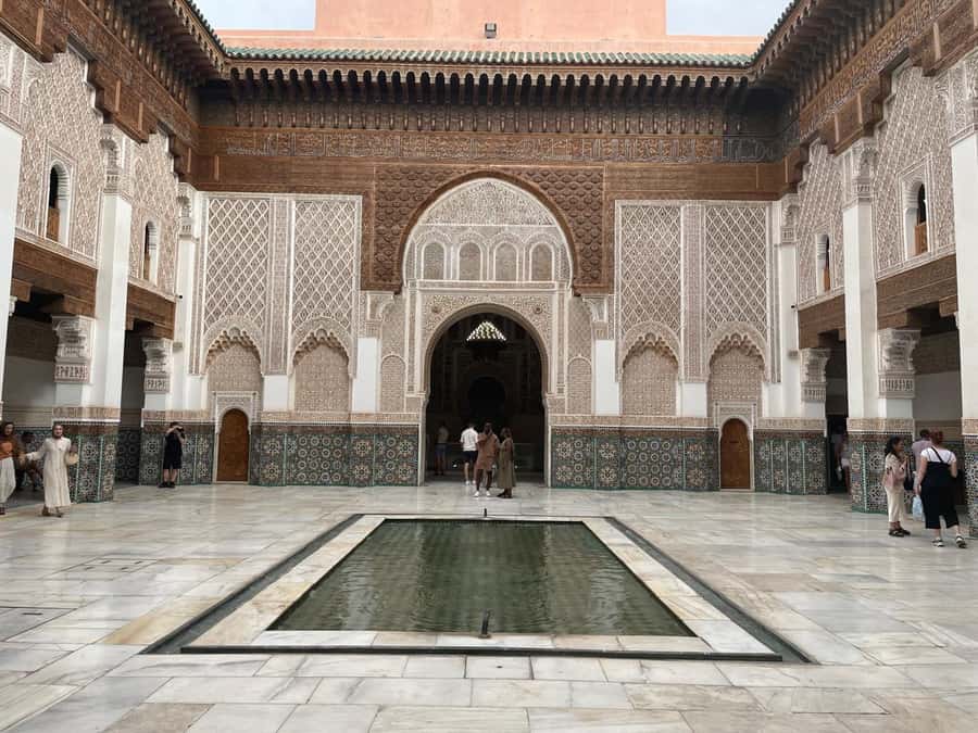 Marrakech: Madrasa Ben Youssef, Secret Garden & Medina Tour - Beyond monuments: hammams, spices, an old water system, and craft souks