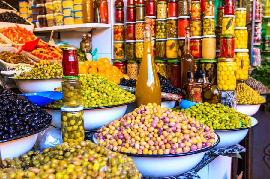 Marrakech: Medina, Souks, Artisans Guided Tour with Mint Tea - Ben Youssef Madrasa: the calmer moment people call a secret garden