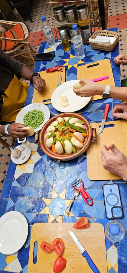 Marrakech: Moroccan Cooking Class with Local Chef - Cooking in the Medina: From Café de France to Riad Black Doors