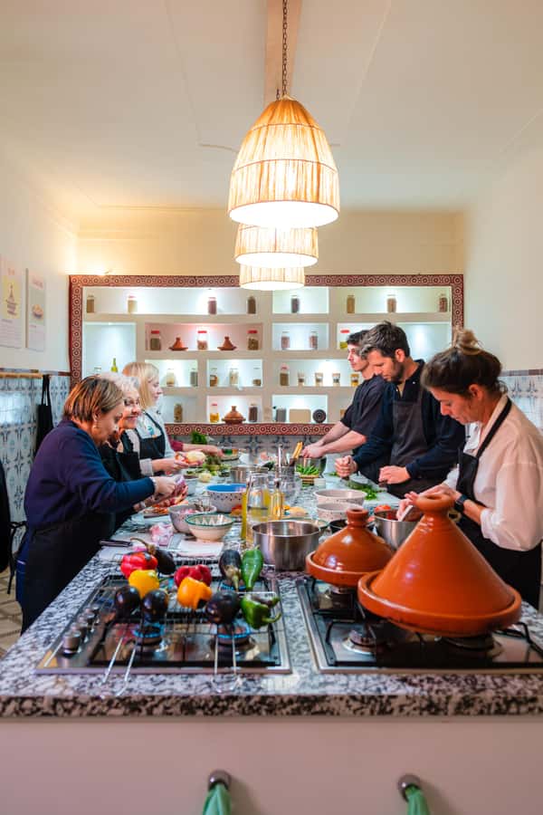 Marrakech: Moroccan Cooking Class with Market Visit and Meal - Inside Flavors of Marrakesh: Kitchen Setup and Group Size