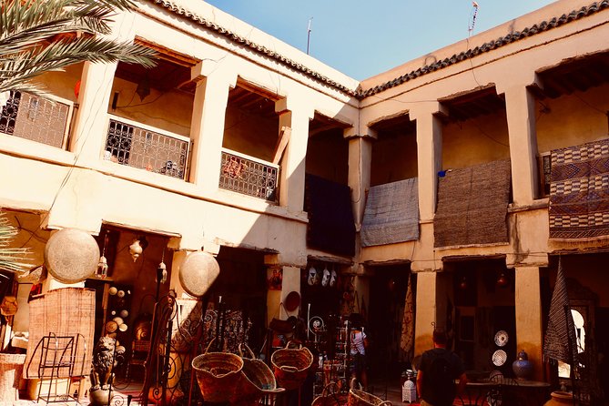 Marrakech Private Full-Day Walking Tour with Hotel Pickup and Drop-Off - Koutoubia Mosque from the outside: orientation in real time