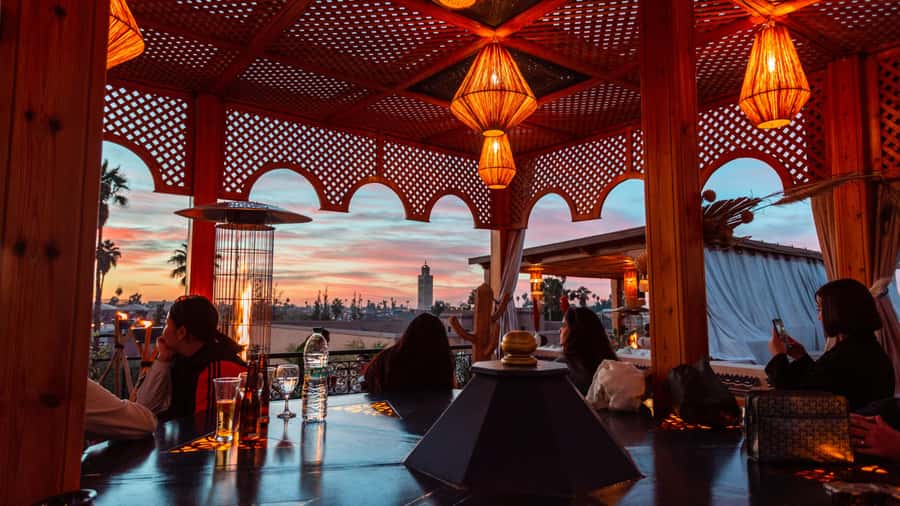 Marrakech: Rooftop Dinner with Koutoubia View - Menus, DJ music, and the atmosphere you can expect