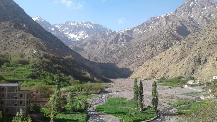 Marrakesh: 2-Day Mt. Toubkal Trek with 1-Night Stay & Meals - Day 1: Imlil to Aremd, Sidi Chamarouch, and Toubkal Refuge (3,207 m)