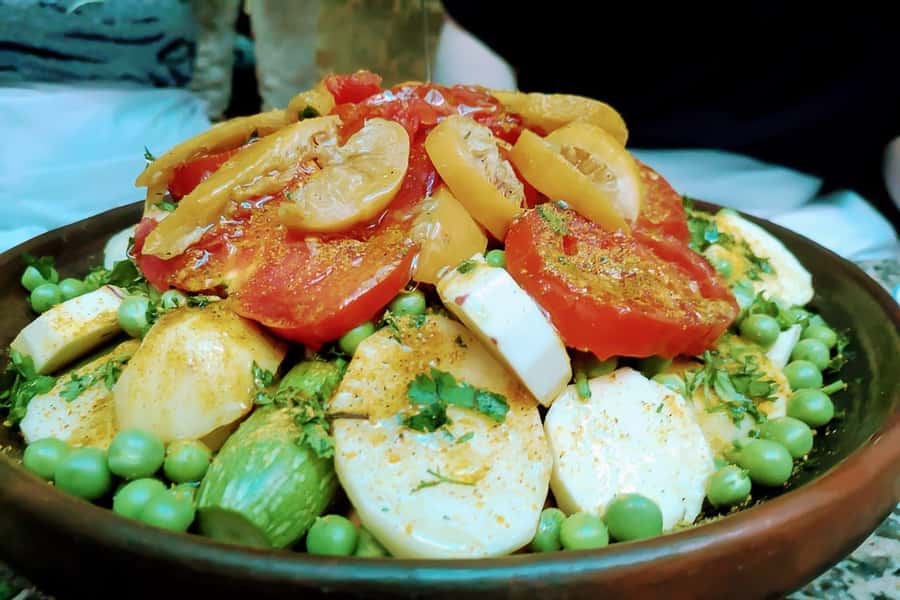 Marrakesh: Private Cooking Class & Local Market Shopping - The tajine workshop: how the meal comes together