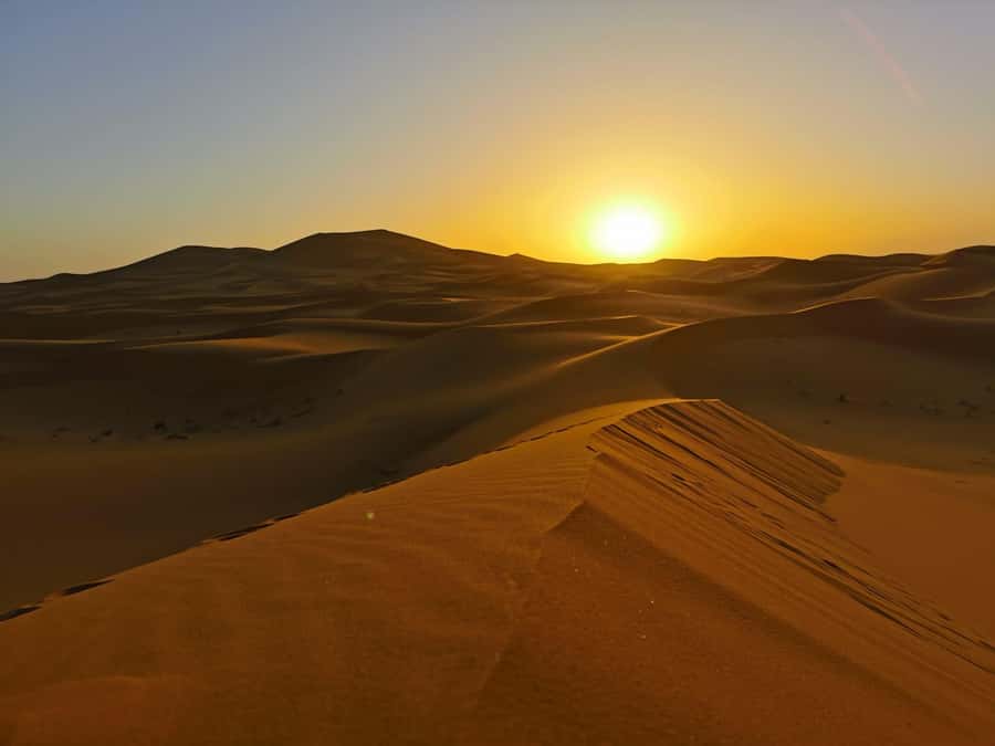 Merzouga: Overnight Camel Trek with Sandboarding - Camp options in Merzouga: standard, royal, or luxury tents