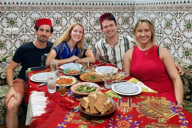 Moroccan Cooking Class & Marrakech Market Visit with Chef Khmisa - The lunch table: tasting together in a family-style setting