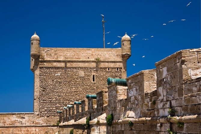 Private Full Day Trip Essaouira from Marrakech - Bab Doukkala gate and the market energy nearby