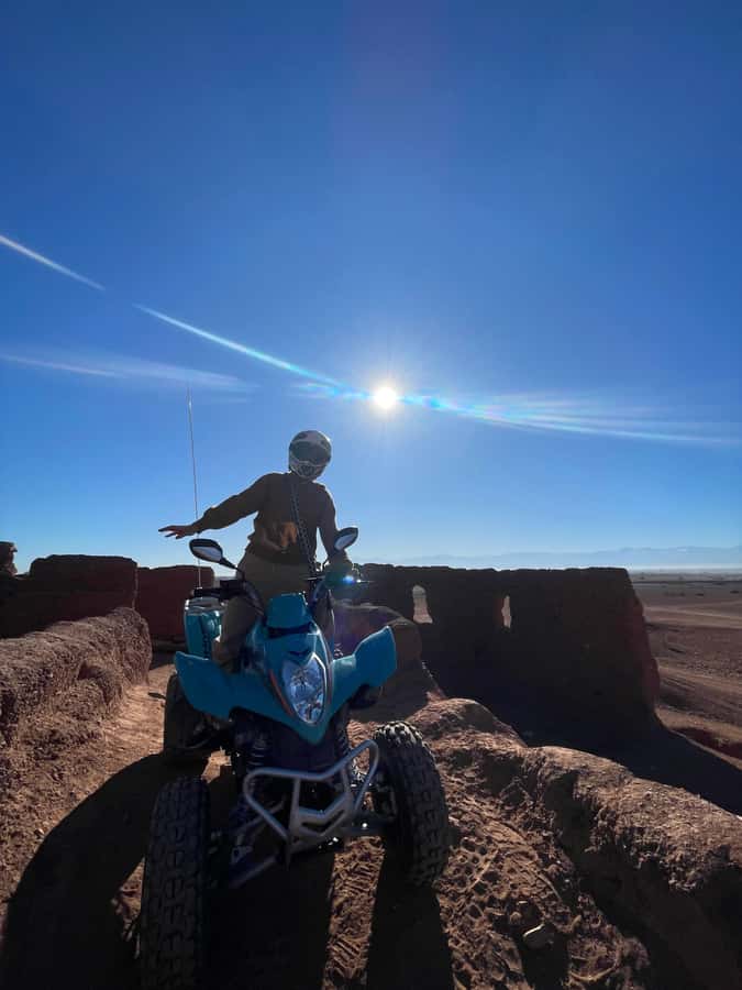 Quad biking in Marrakech's desert palm grove - Safety gear and first-control lessons: the calm start before the dust