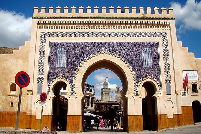 Shared Half Day Guided Fes Tour with Local Guide - Bab Boujloud (Blue Gate): A gate that tells two eras