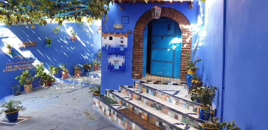 Tangier: Full-Day Trip to Chefchaouen - Mellah and Es Sueca: craft streets where shopping feels grounded